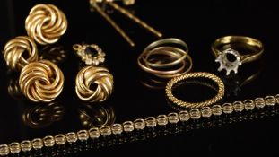 Selection of gold jewellery, including three pairs of earrings, a Russian wedding band, a rope band,