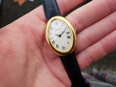 MID SIZE CARTIER BAIGNOIRE MANUAL WOUND IN 18K YELLOW GOLD MANUALLY WOUND WRISTWATCH, oval white