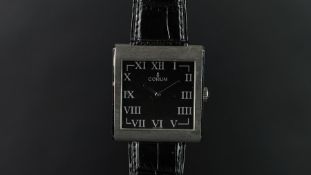 GENTLEMEN'S CORUM BUCKINGHAM WRISTWATCH, square black dial with Roman numerals and silver hands,