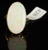 Large opal ring, mounted in unmarked yellow metal, large oval opal measuring an estimated 24 x 14