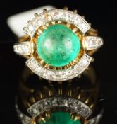 Emerald and diamond ring, central round cabochon cut emerald, surrounded by single cut diamonds,