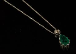 Emerald and diamond drop pendant, mounted in unmarked white and yellow metal, pear shaped emerald
