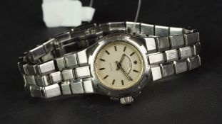 LADIES' VACHERON & CONSTANTIN OVERSEAS WRISTWATCH, circular silver dial with silver hour markers and