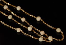 A white coral and gold necklace, twenty-four 5.88mm scalloped coral beads, separated by gold