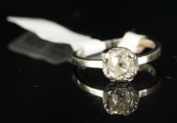 Single stone diamond ring, old cut diamond weighing an estimated 1.06ct, mounted in white metal,