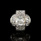 Art Deco diamond cluster ring, central old mine cut diamond weighing an estimated 1.09ct,