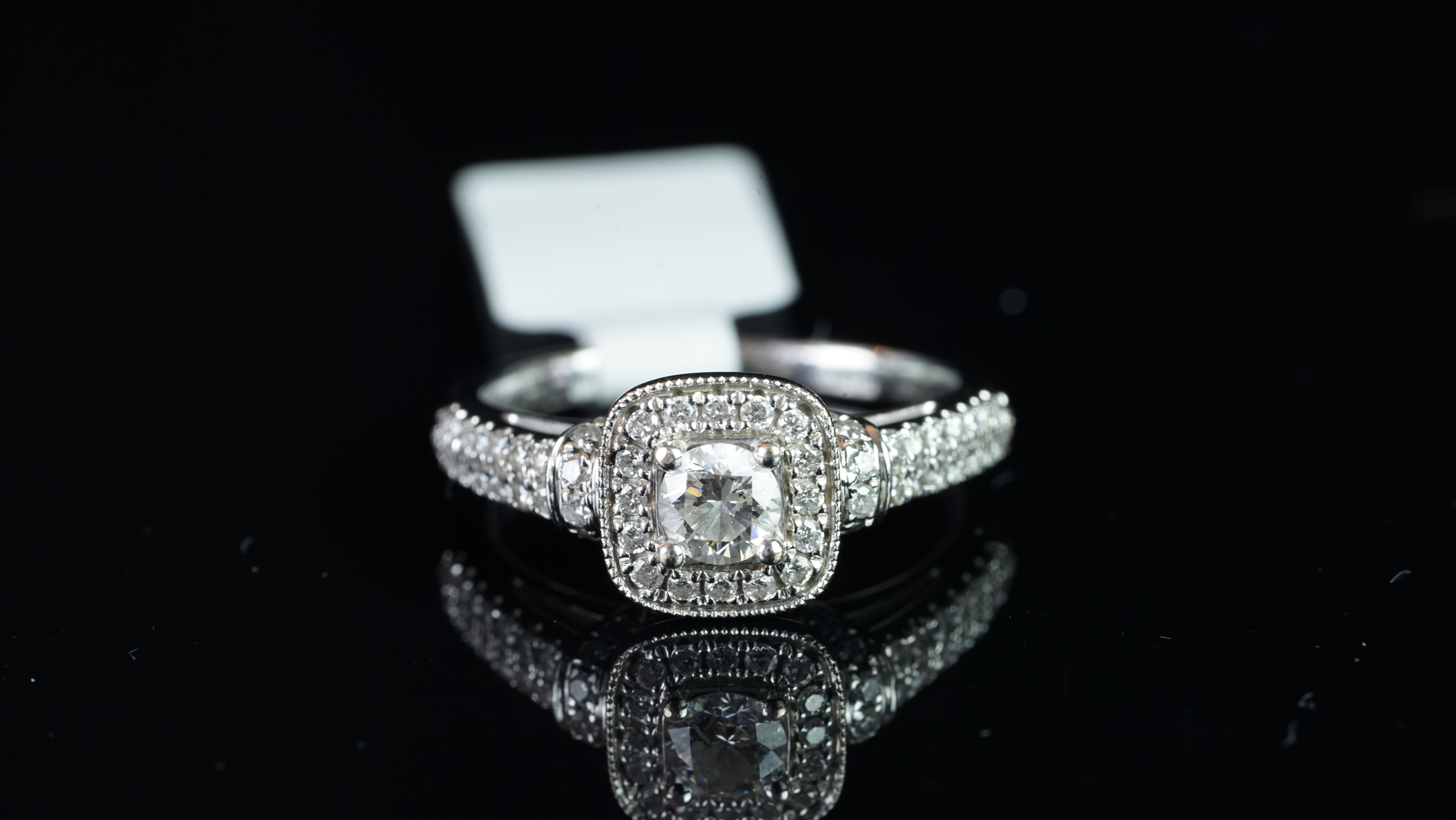 A diamond cluster ring by Vera Wang, from the 'Love' collection, set with round brilliant cut