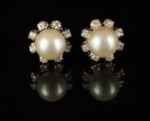 Pair of pearl and diamond cluster stud earrings, mounted in unmarked white metal, butterfly fittings