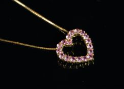 NEW OLD STOCK, UNWORN RETIRED STOCK - A pink sapphire heart pendant, nineteen round cut pink