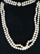 Two row pearl necklace, 6.5mm freshwater cream pearls, with champagne overtones, on a yellow metal