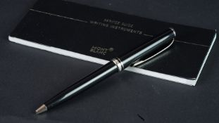 Mont Blanc ballpoint pen, with service guide and warranty.