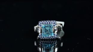 NEW OLD STOCK, UNWORN RETIRED STOCK - Blue topaz and sapphire ring, central square step cut blue
