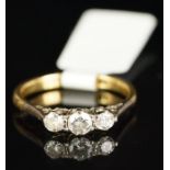 Three stone diamond ring, mounted in yellow and white metal stamped 18ct Plat, three round brilliant