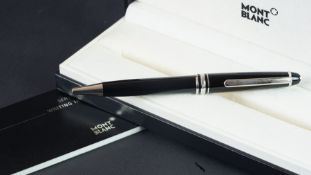 Mont Blanc ballpoint pen in box, with service guide and warranty.