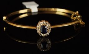 Antique sapphire and diamond cluster hinged bangle, mounted in unmarked yellow metal, central