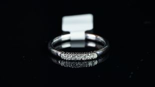 Diamond half eternity ring, mounted in hallmarked 18ct white gold, seven round brilliant cut
