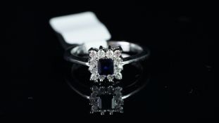 Sapphire and diamond square shaped cluster ring, mounted in unmarked white metal, central square