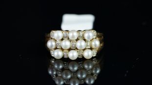 Pearl and diamond three row ring, mounted in yellow metal with French marks for 18ct, finger size