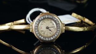 LADIES' 18K GOLD, DIAMOND BEZEL, BRACELET WATCH, VINTAGE MANUALLY WOUND WRISTWATCH, circular