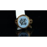 A mourning signet ring, chalcedony seal set with a monogram of the letters CSN, the hinged top opens