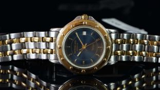 GENTLEMEN'S RAYMOND WEIL TANGO WRISTWATCH, circular navy dial with gold hour markers and hands, date