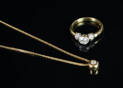 Diamond ring and pendant set, single stone diamond ring, central brilliant cut diamond rub over set,