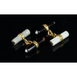Pair of mother of pearl and stone set bar cufflinks, mounted with unmarked yellow metal, gross