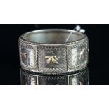Vintage silver bird panel bangle, three panels each set with a gold flashed bird, decorative