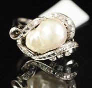 Baroque pearl and diamond ring, mounted in unmarked white metal, set with a large baroque pearl to