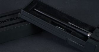 Mont Blanc ballpoint pen in box, with service guide and warranty.