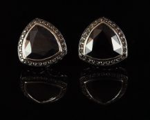 Pair of sapphire and black stone cluster earrings, mounted in unmarked white metal, central