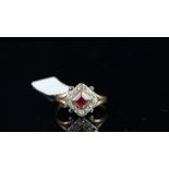 Red stone and diamond cluster ring, mounted in unmarked rose coloured metal, central square shaped