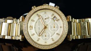 LADIES' MICHAEL KORS CHRONOGRAPH WRISTWATCH, circular cream triple register dial with a date