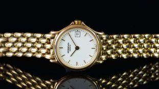 LADIES' RAYMOND WEIL WRISTWATCH, circular white dial with gold hour markers, hands and a date