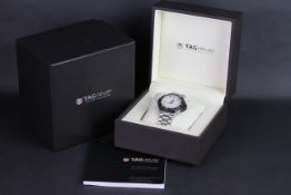 TAG HEUER FORMULA 1 REFERENCE WAH1111, circular white dial, baton hour markers, black rotating outer