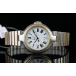 DUNHILL WRISTWATCH, circular white dial, black Roman numerals, date aperture, gold bezel,