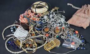 Mixed lot of vintage silver and costume jewellery including amber, bangles, beaded necklaces etc.