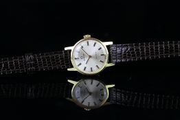 LADIES' OMEGA GENEVE WRISTWATCH W/ BOX, circular silver dial with gold baton hour markers and an