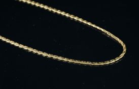 Flat twist link chain, stamped 585 and Italy to the clasp, approximate length 48cm, approximate