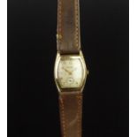 GENTLEMEN'S BULOVA VINTAGE WRISTWATCH, rounded rectangular patina dial with gold Arabic numerals and