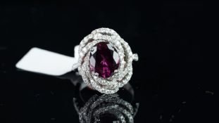 NEW OLD STOCK, UNWORN RETIRED STOCK - Rhodalite garnet and diamond dress ring, central oval