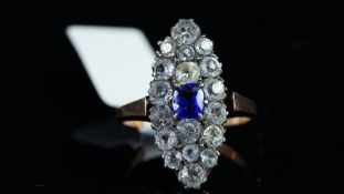 Vintage blue and white paste stone cluster ring, mounted in unmarked rose metal tested as 9ct,