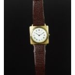 MID SIZE UNIVERSAL GENEVE 18K GOLD DRESS WATCH, circular white dial with roman numerals and gun