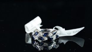 NEW OLD STOCK, UNWORN RETIRED STOCK - Sapphire and diamond dress ring, marquise cut blue sapphires