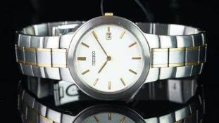 NEW OLD STOCK - GENTLEMEN'S BICOLOUR SEIKO QUARTZ WRIST WATCH, REF GW553, 35mm case, round