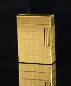 Dupont gold cased lighter, serial number 1L 5AP43, weight approximately 96.2 grams. A/F currently