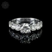 Seven stone diamond ring, seven round brilliant cut diamonds, weighing an estimated total of 3.40ct,