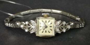 LADIES' WITTNAUER DIAMOND SET COCKTAIL WATCH, square dial with baton hour markers, 17 jewelled
