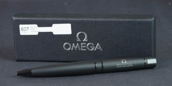 Omega matte black ballpoint pen, in cardboard Omega box with lid.