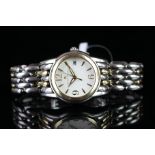 MAURICE LACROIX BI-COLOUR WRISTWATCH, circular white dial, gold hour markers, polished gold bezel,